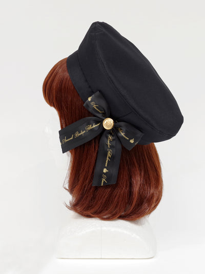 Beret with message ribbon brooch