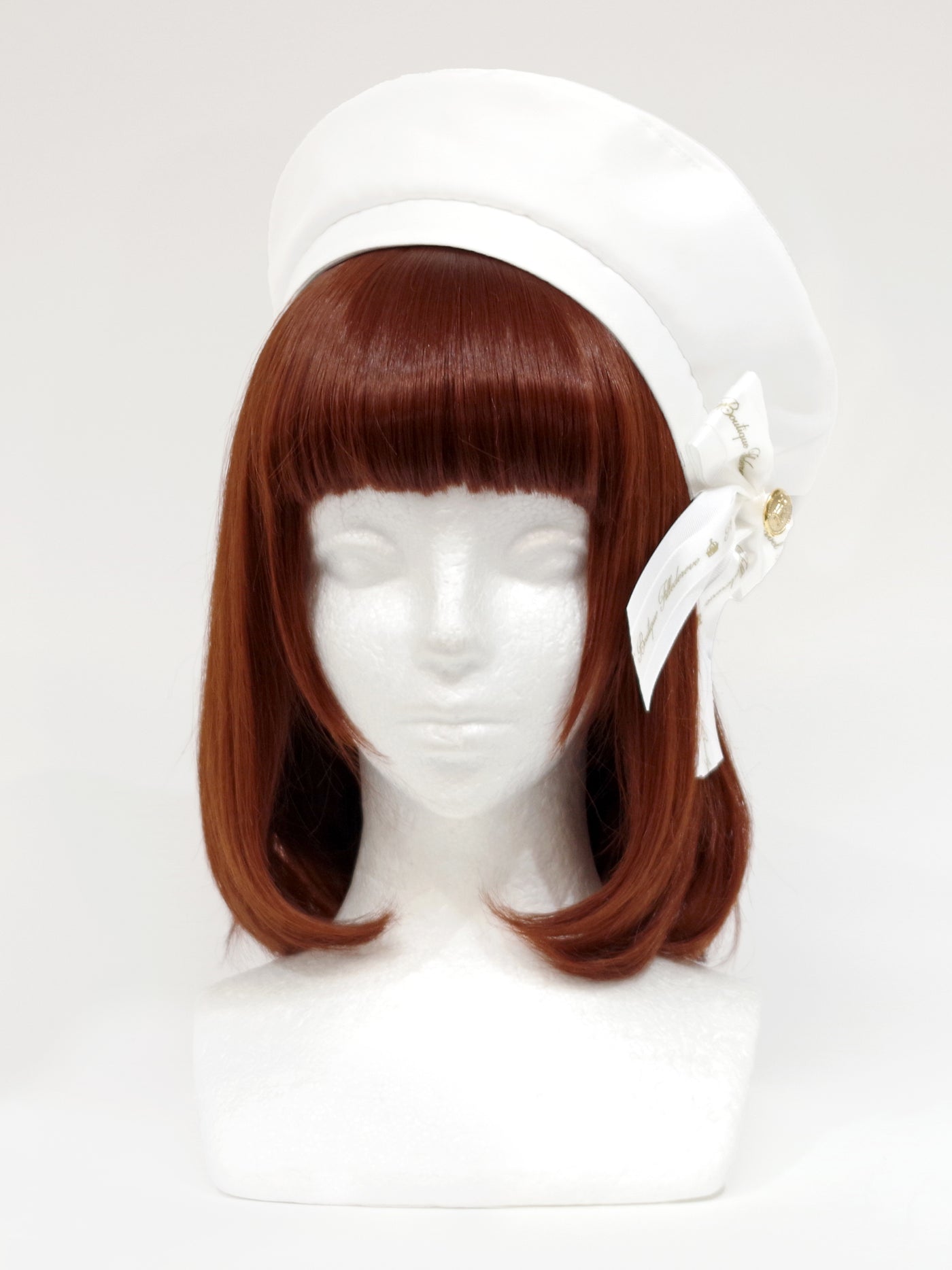 Beret with message ribbon brooch