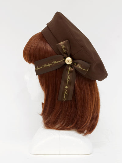 Beret with message ribbon brooch