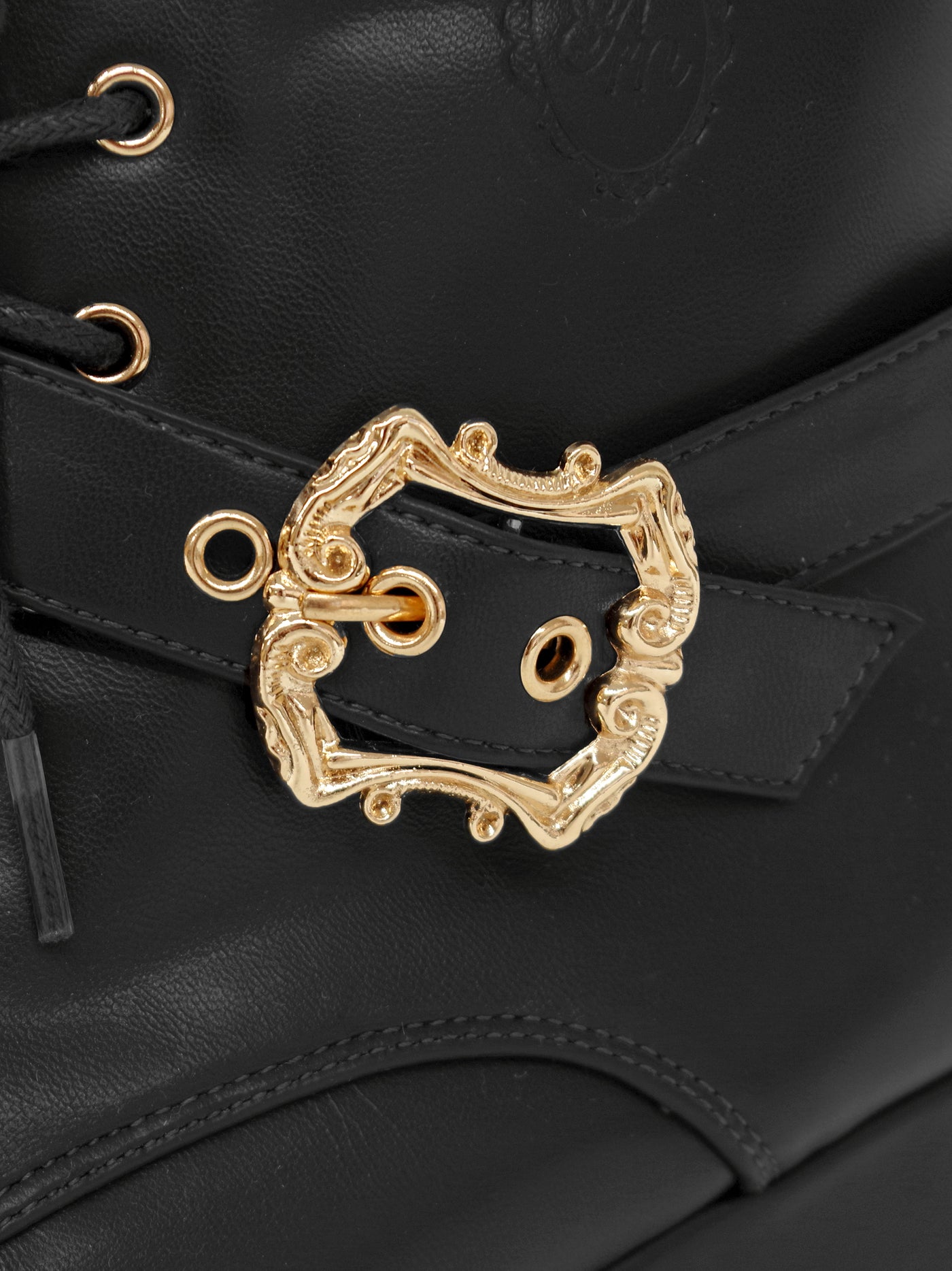 Monogram embossed frilled short boots