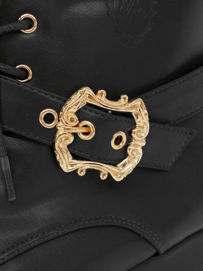 Monogram embossed frilled short boots