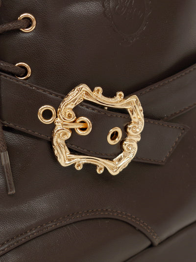 Monogram embossed frilled short boots