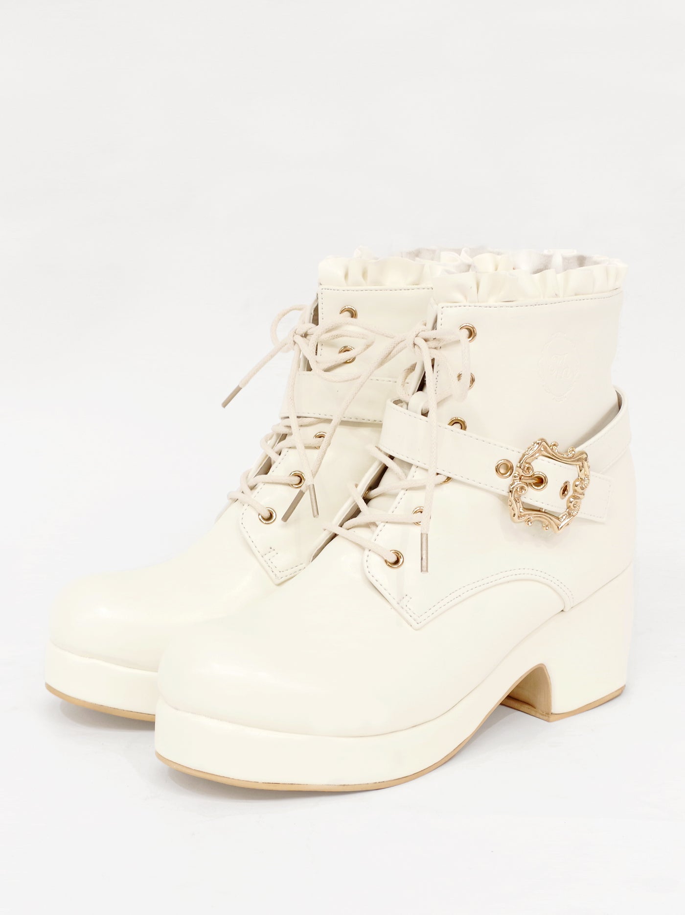 Monogram embossed frilled short boots