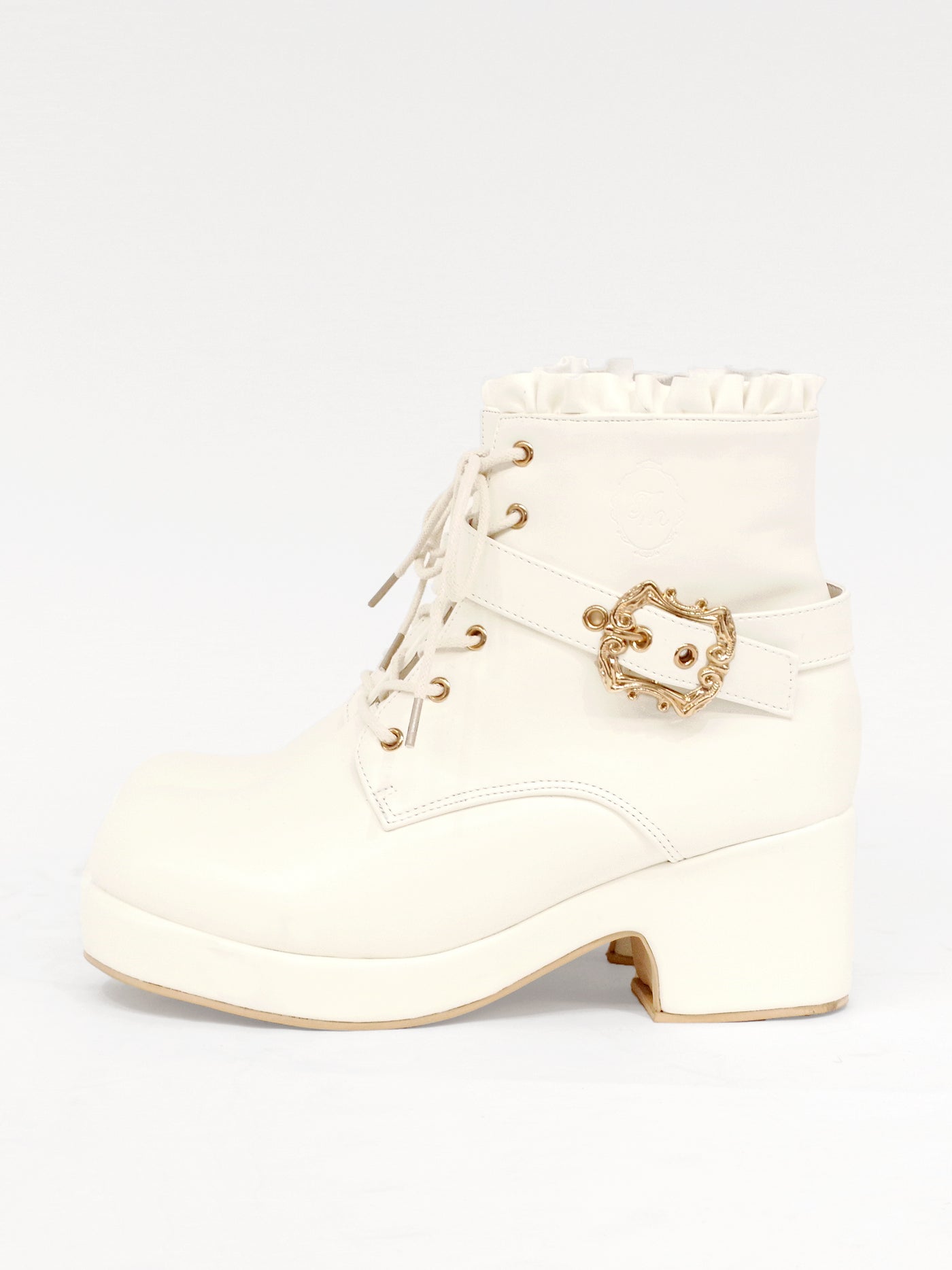 Monogram embossed frilled short boots